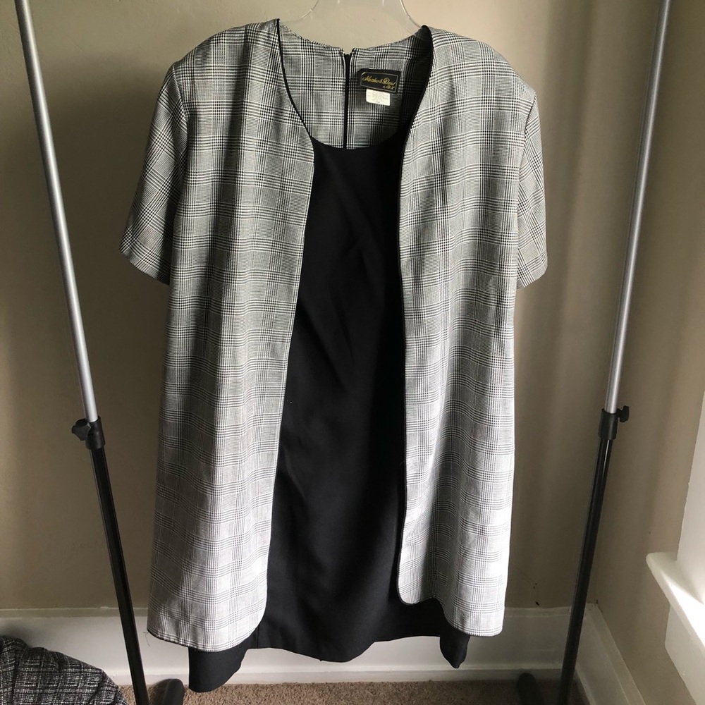 Black dress with attached patterned jacket